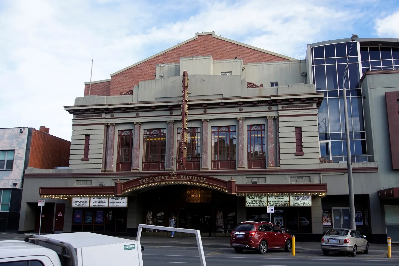 The Regent theatre’s front today: a classical façade above a canopy carrying its name.